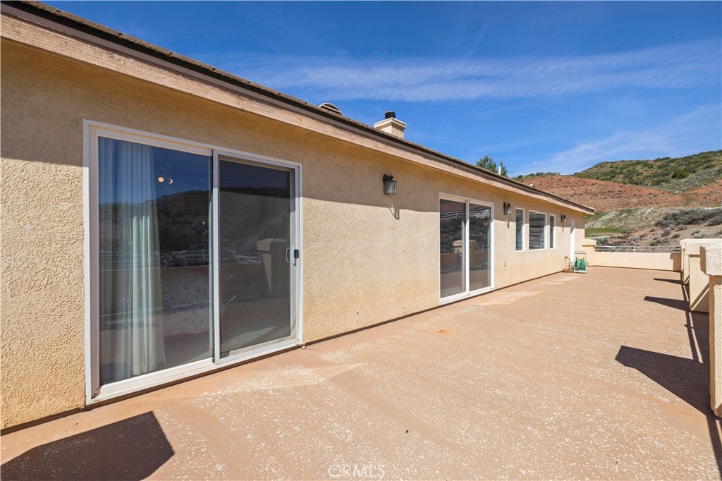 34250 McEnnery Canyon Road Acton, CA 93510 - Photo 30 of 63 a front view of a house with a big yard