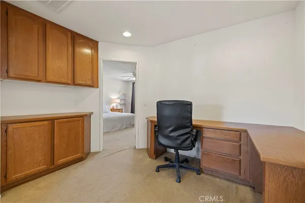 a bed room with a bed and a window