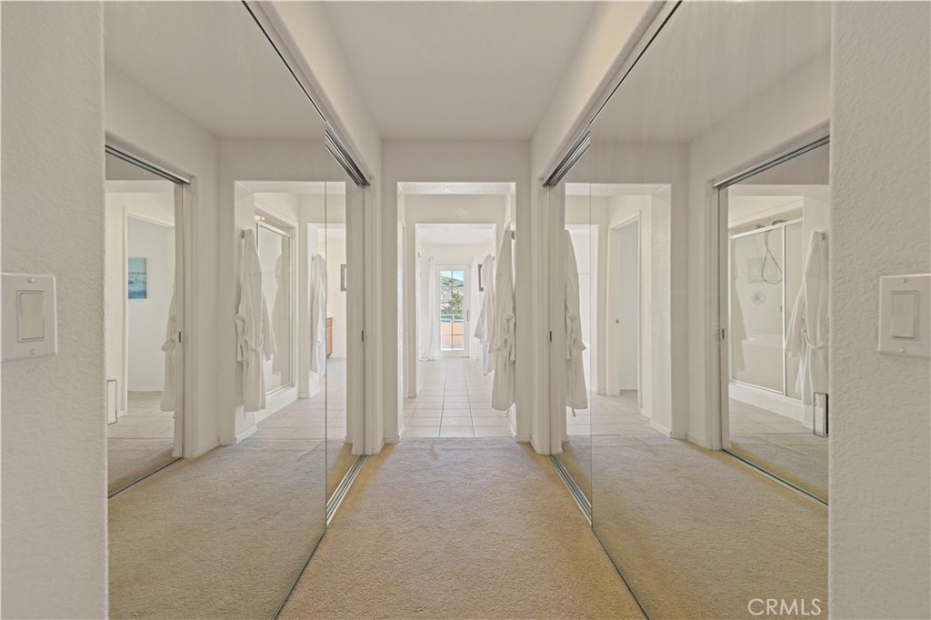 34250 McEnnery Canyon Road Acton, CA 93510 - Photo 46 of 63 a view of a hallway with wooden shelves