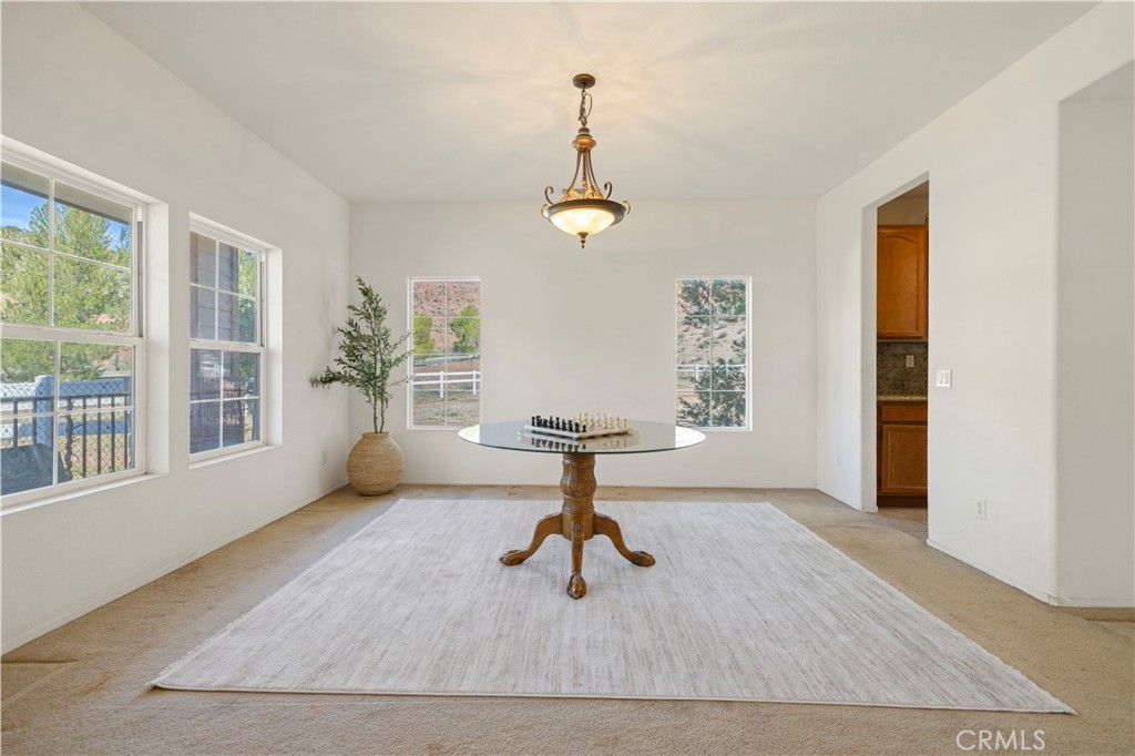 34250 McEnnery Canyon Road Acton, CA 93510 - Photo 5 of 63 a living room with furniture and windows