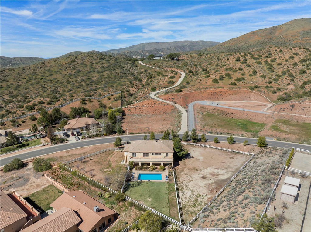 34250 McEnnery Canyon Road Acton, CA 93510 - Photo 58 of 63 an aerial view of residential houses with outdoor space