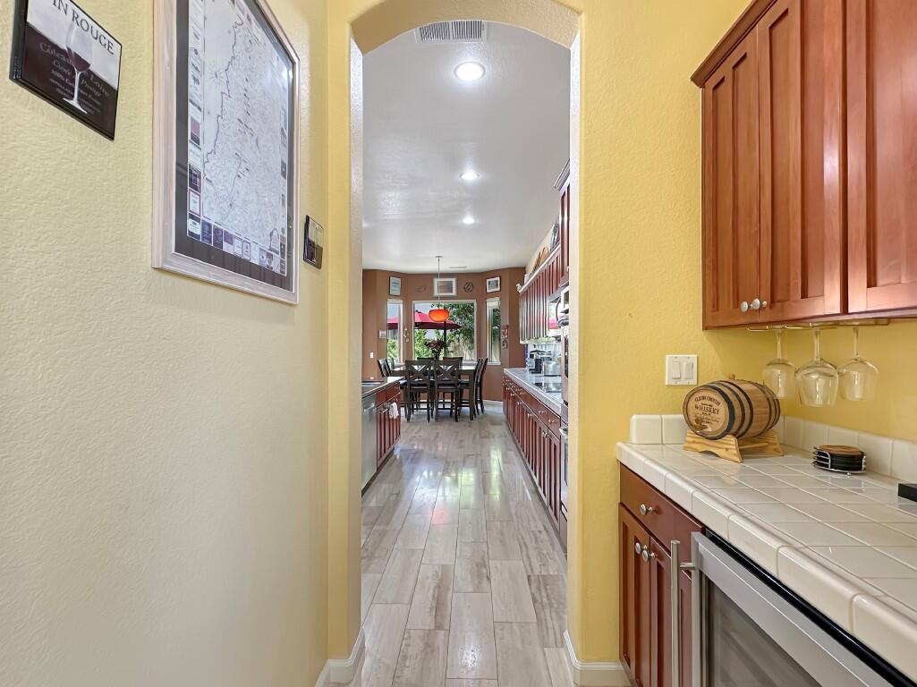 10555 Hampton Creek Drive Reno, NV 89521 - Photo 13 of 50 a view of a kitchen from the hallway