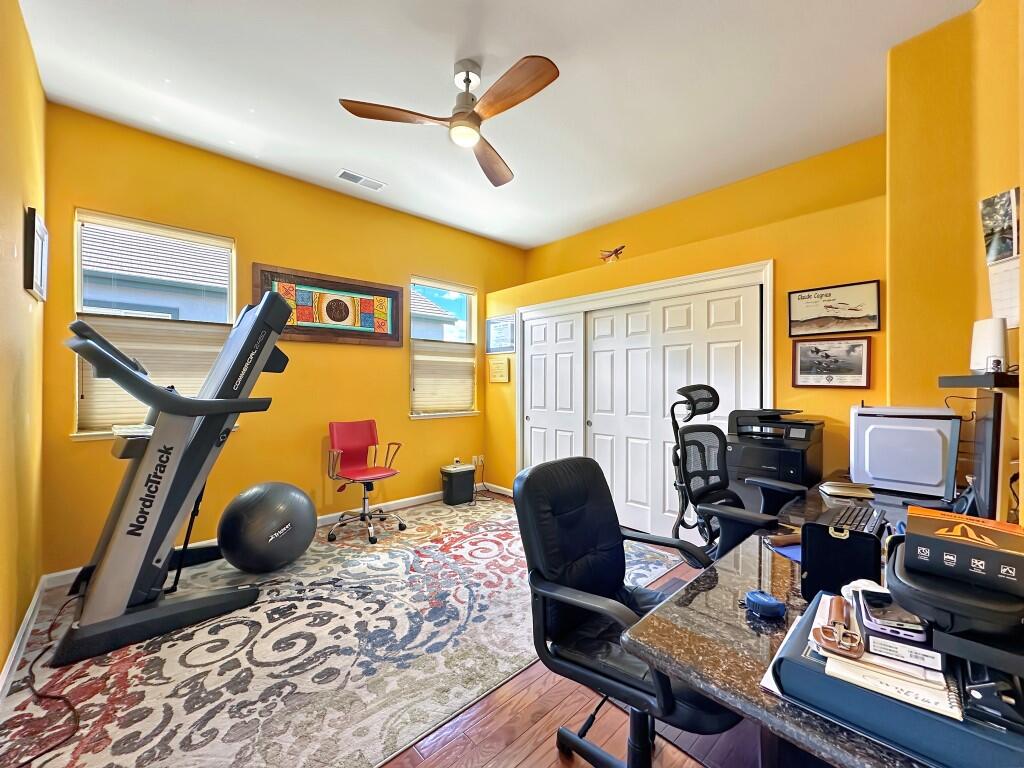 10555 Hampton Creek Drive Reno, NV 89521 - Photo 26 of 50 a view of a workspace with furniture and a window