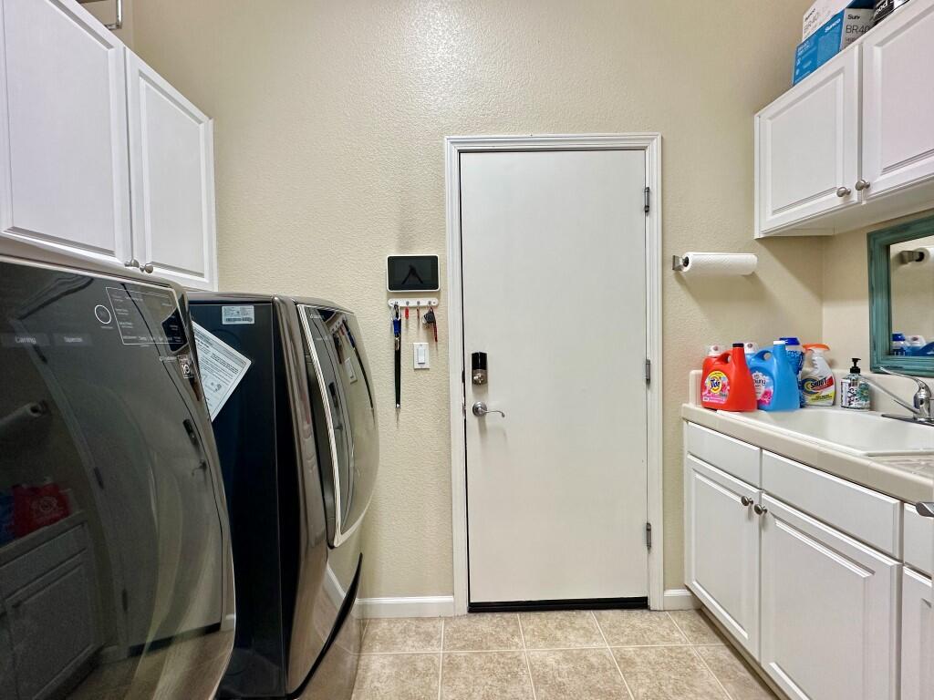 10555 Hampton Creek Drive Reno, NV 89521 - Photo 34 of 50 a view of a refrigerator and storage