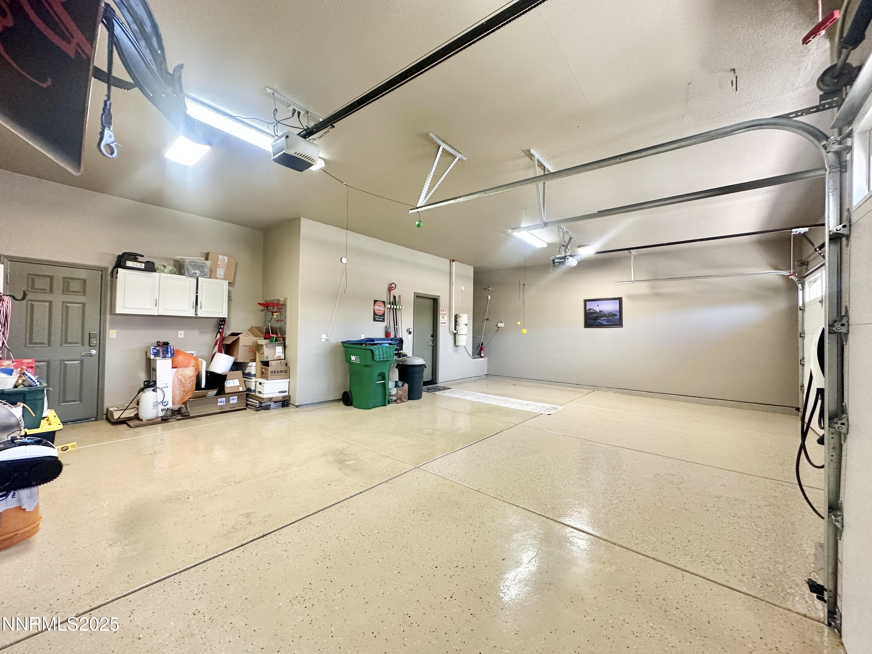 10555 Hampton Creek Drive Reno, NV 89521 - Photo 36 of 50 a view of a garage with storage and utility