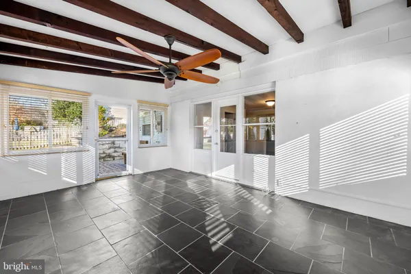 a view of entryway with kitchen