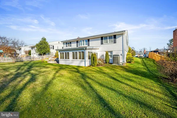 a view of a house with a big yard