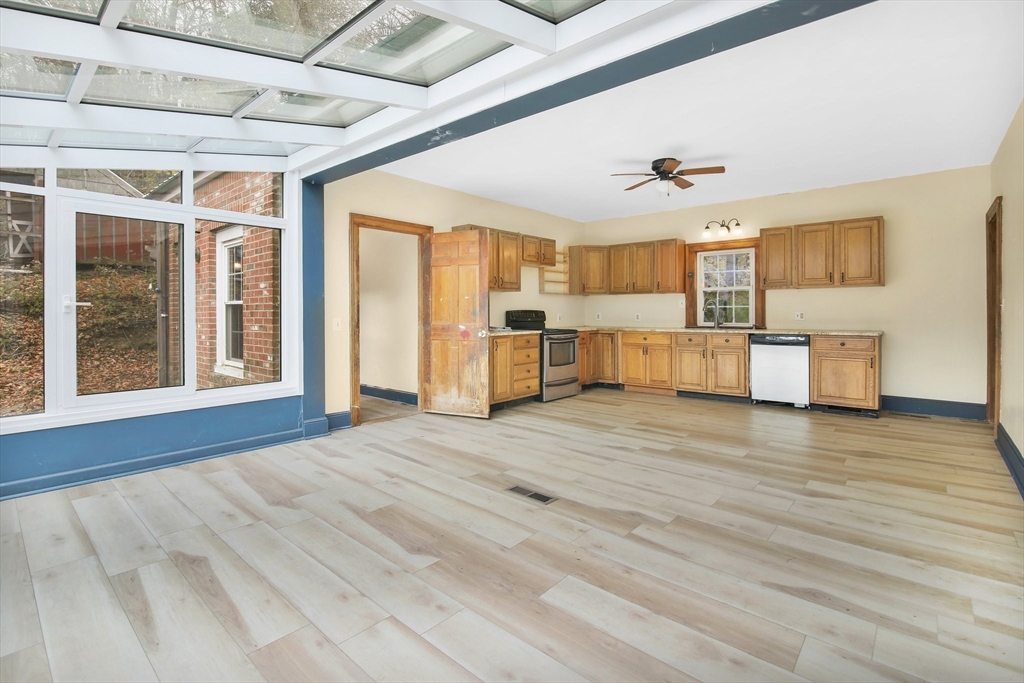 40 Holcomb Road Chester, MA 01011 - Photo 3 of 34 a view of a kitchen with furniture and wooden floor