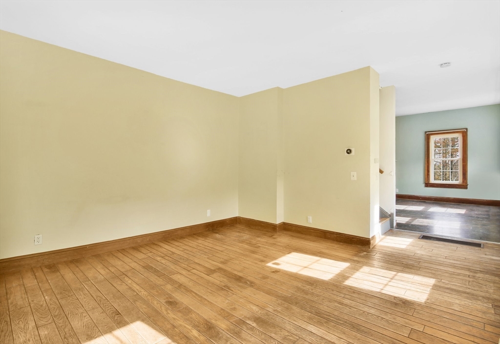 40 Holcomb Road Chester, MA 01011 - Photo 8 of 34 a view of empty room with wooden floor