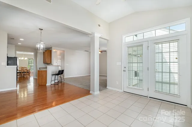 a view of an entryway with wooden floor
