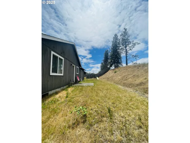 a view of a house with a large window