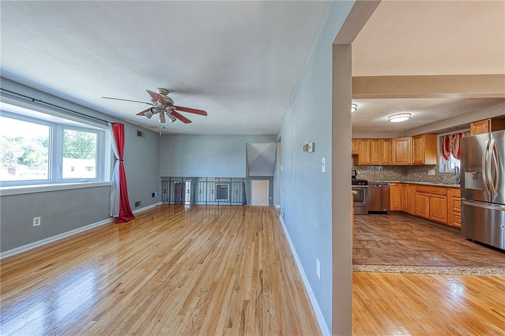 11468 Drop Irwin, PA 15642 - Photo 20 of 49 view of living room to dining room to kitchen.
