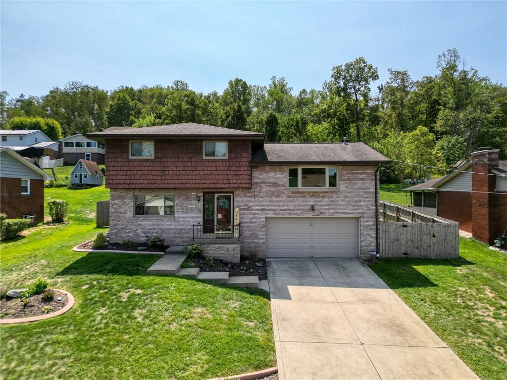 11468 Drop Irwin, PA 15642 - Photo 2 of 49 Landscaped, fenced back yard, deck, sunroom and patio.