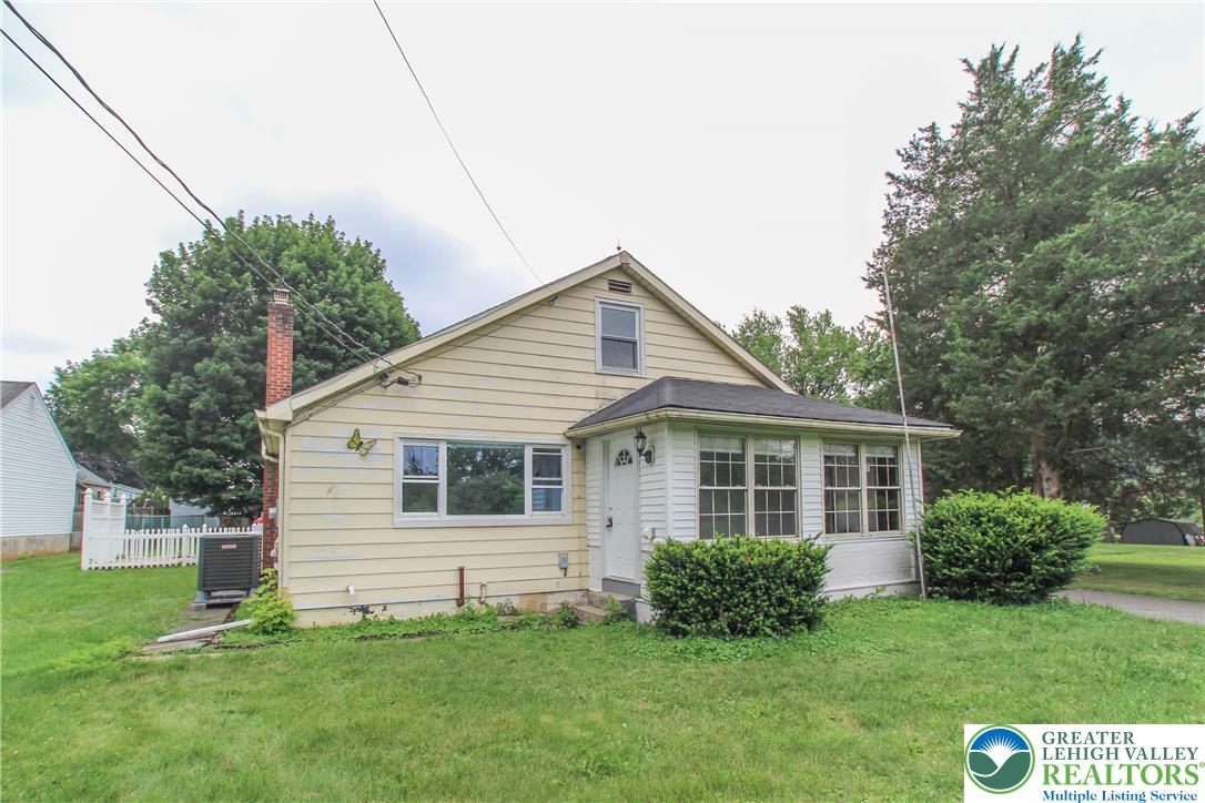492 Filetown Road Nazareth, PA 18064 - Photo 2 of 30 A classic ranch home features yellow siding and a welcoming covered entry porch.