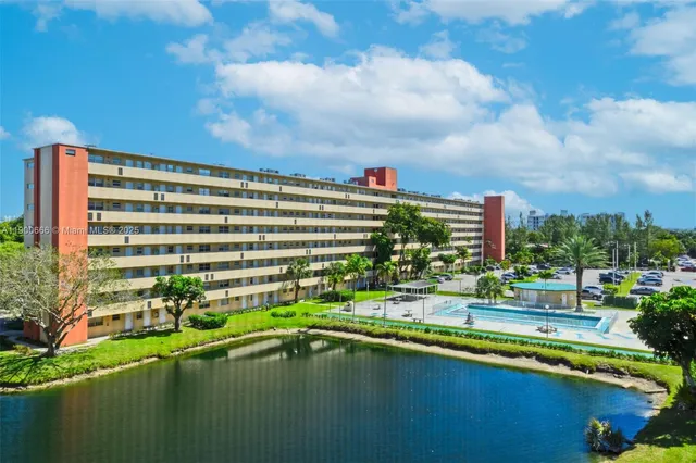 a view of swimming pool from a balcony