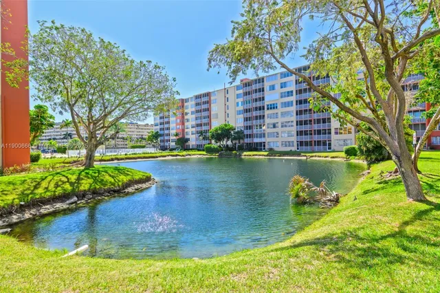 a view of a lake with a building in the background