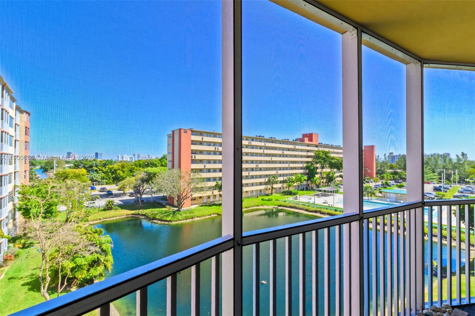 1770 Northeast 191st Street, Unit 5081 Miami, FL 33179 - Photo 2 of 35 a view of city from a balcony