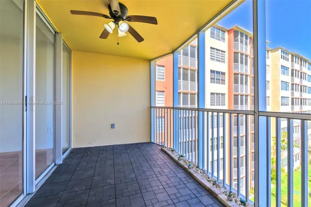 a view of a hallway with windows