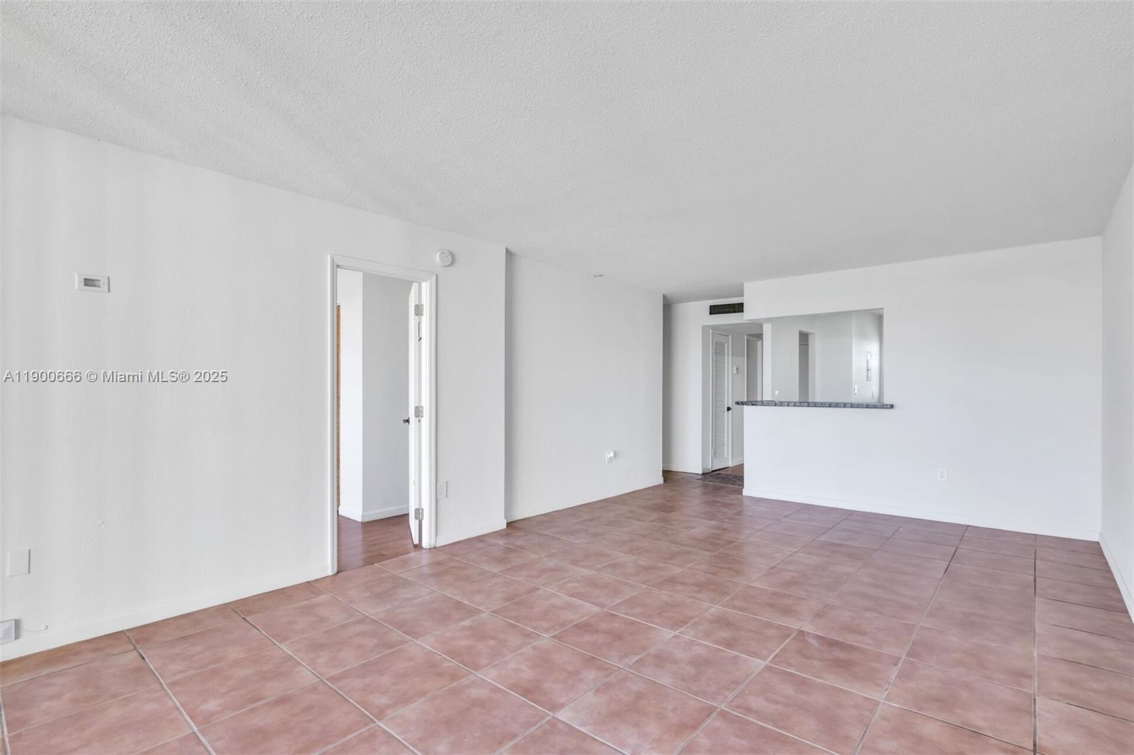 1770 Northeast 191st Street, Unit 5081 Miami, FL 33179 - Photo 32 of 35 a view of empty room with wooden floor