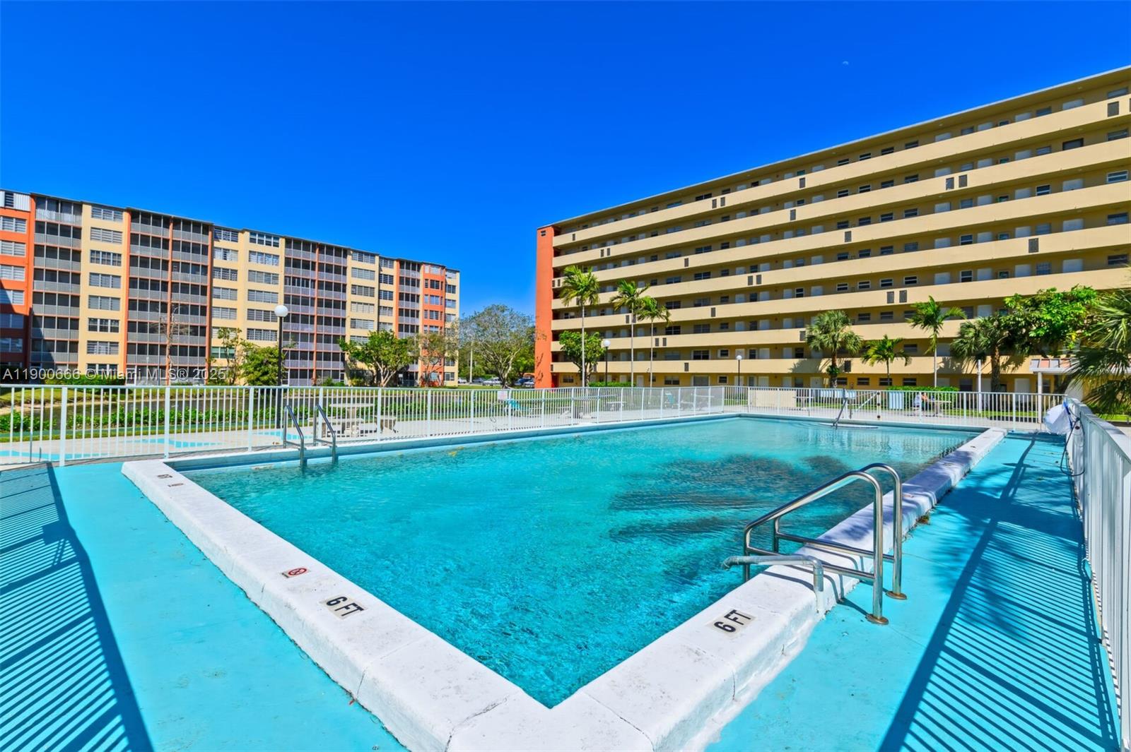 1770 Northeast 191st Street, Unit 5081 Miami, FL 33179 - Photo 10 of 35 a view of a swimming pool with a patio