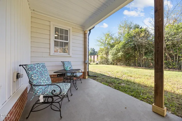 a view of a two chair in the porch
