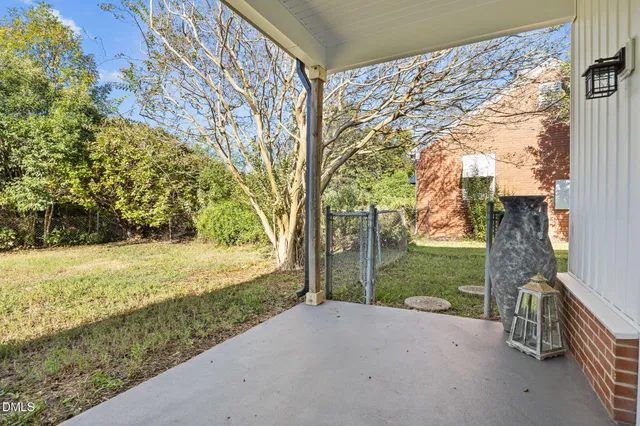 a view of a yard with an outdoor space