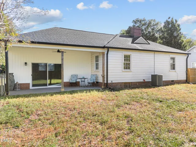 a house view with a backyard space