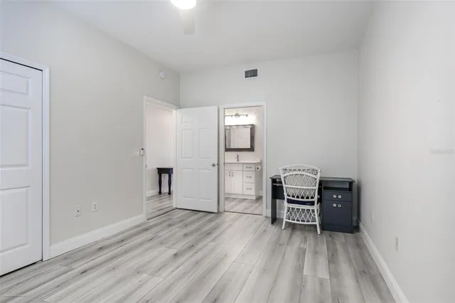 a view of a livingroom with furniture and wooden floor