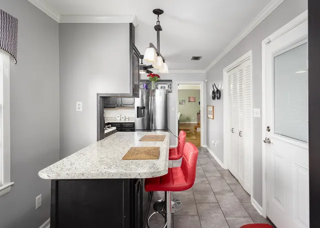 a view of a dining room with furniture