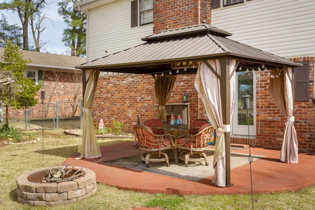 a house view with a outdoor space