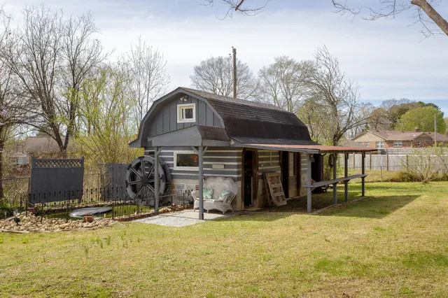 an aerial view of house with pool