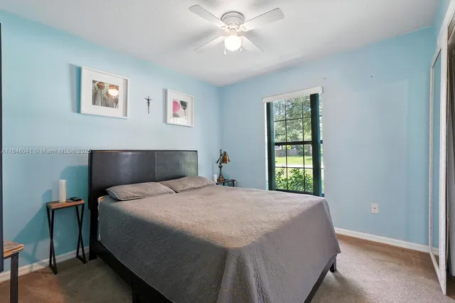 a room with furniture and a window