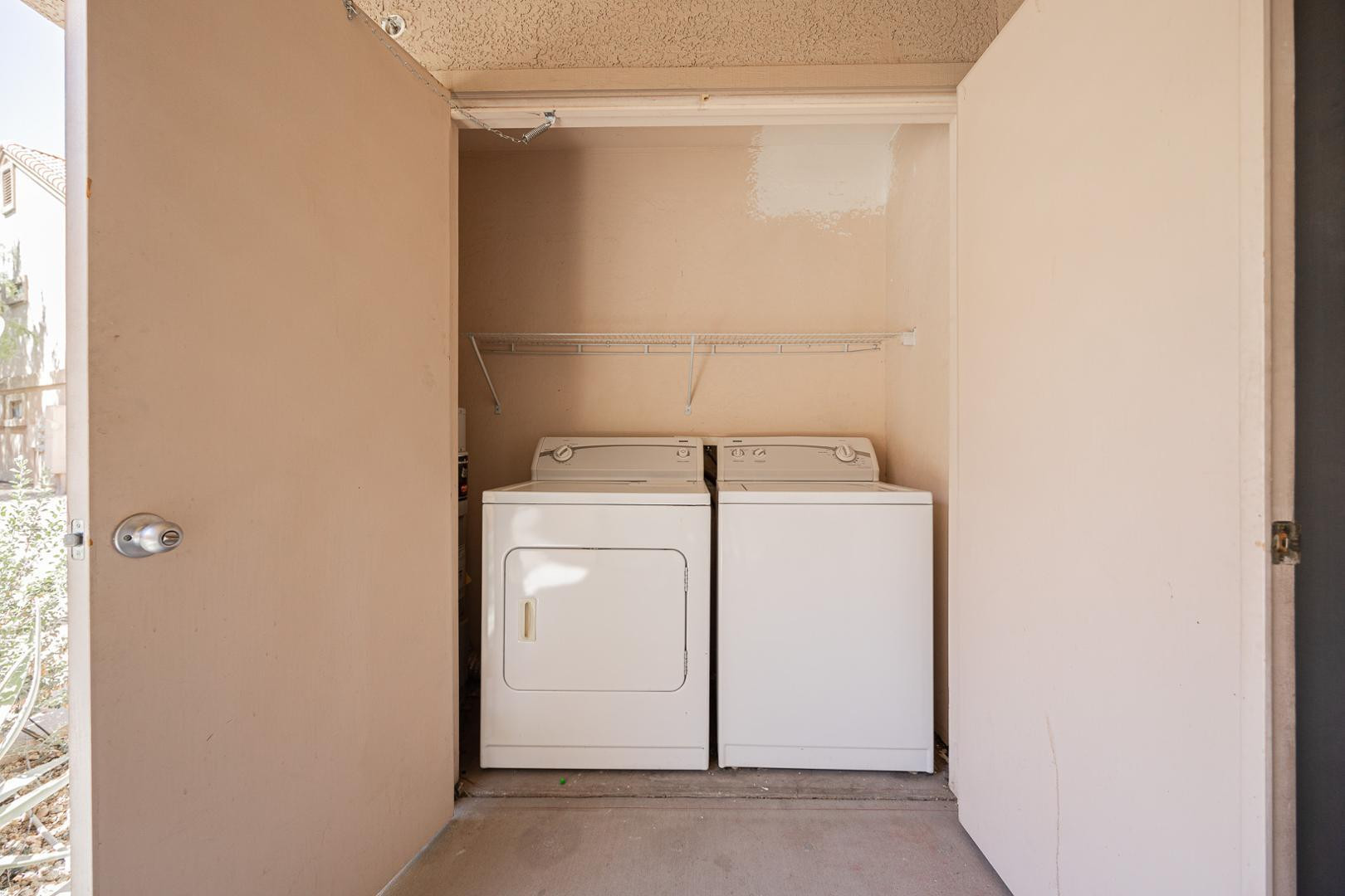 1287 North Alma School Road, Unit 131 Chandler, AZ 85224 - Photo 18 of 24 a utility room with dryer and washer