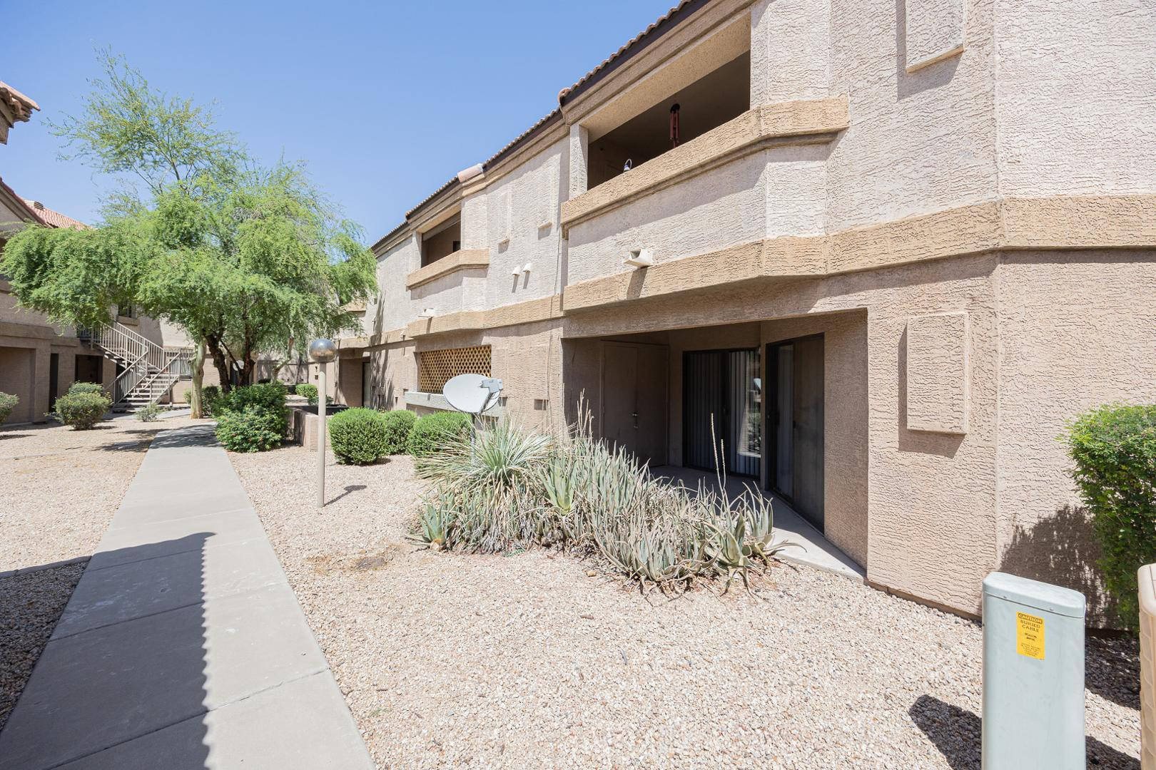 1287 North Alma School Road, Unit 131 Chandler, AZ 85224 - Photo 19 of 24 a view of a house with a patio