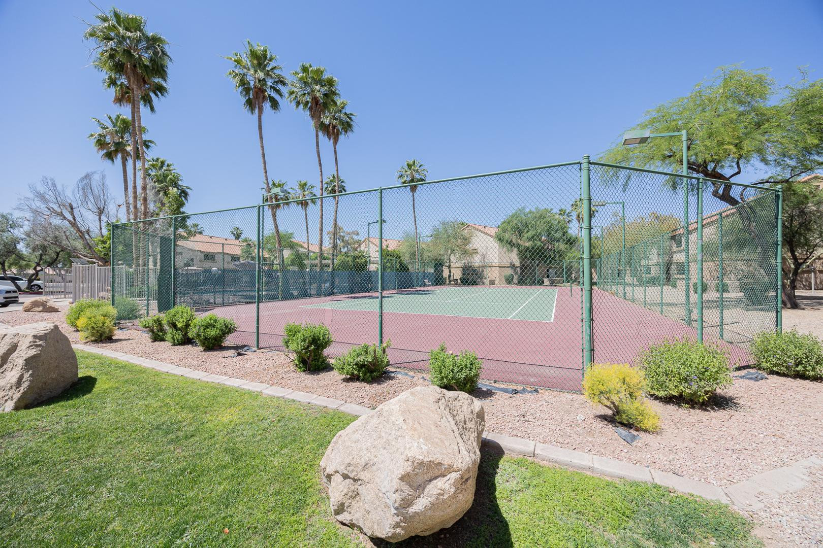 1287 North Alma School Road, Unit 131 Chandler, AZ 85224 - Photo 24 of 24 a view of a backyard with swimming pool
