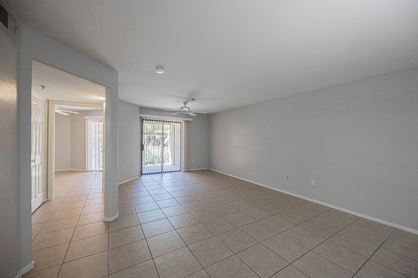 1287 North Alma School Road, Unit 131 Chandler, AZ 85224 - Photo 6 of 24 a view of an empty room and window