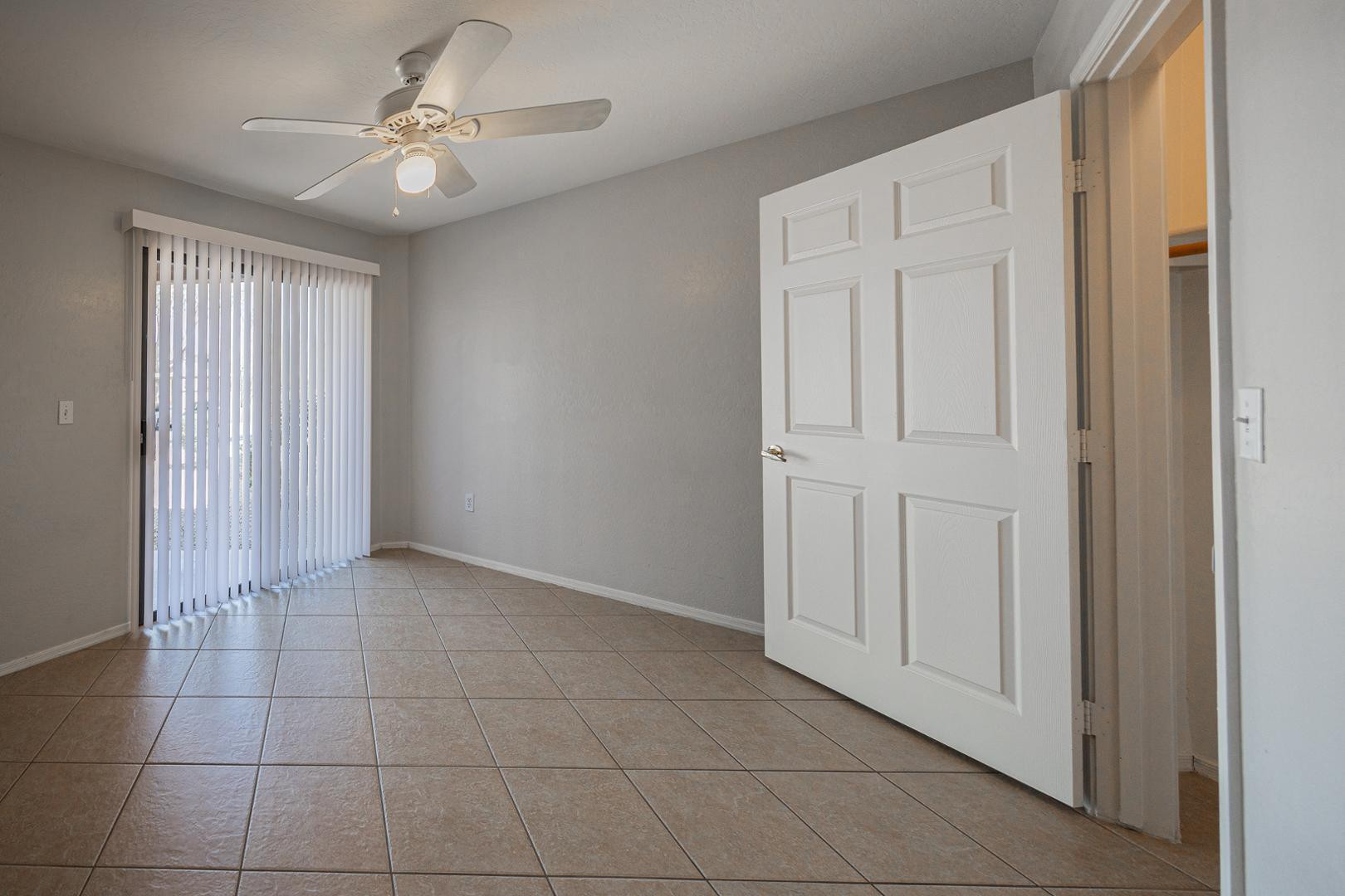 1287 North Alma School Road, Unit 131 Chandler, AZ 85224 - Photo 10 of 24 a view of an empty room with a window