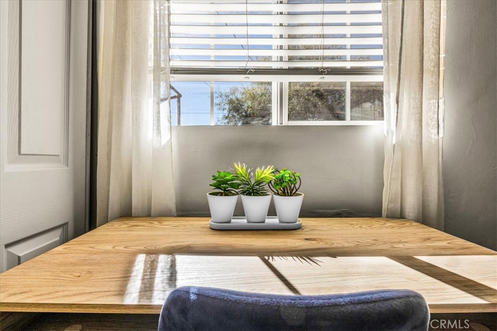 74825 Alta Loma Drive Twentynine Palms, CA 92277 - Photo 21 of 36 a bedroom with a bed and a window