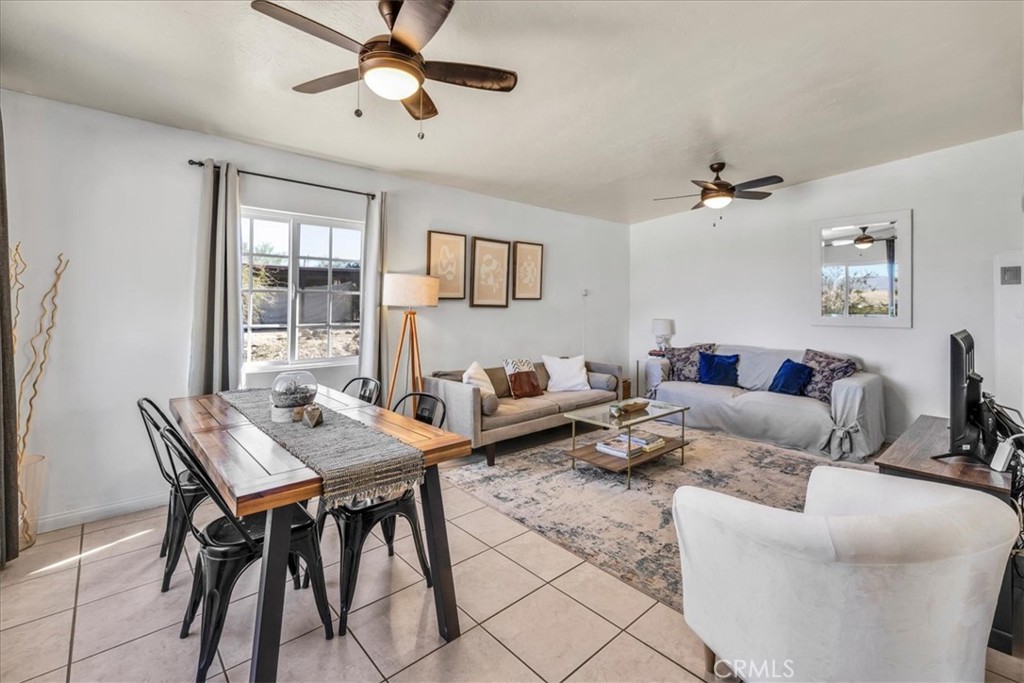 74825 Alta Loma Drive Twentynine Palms, CA 92277 - Photo 8 of 36 a living room with furniture and a window