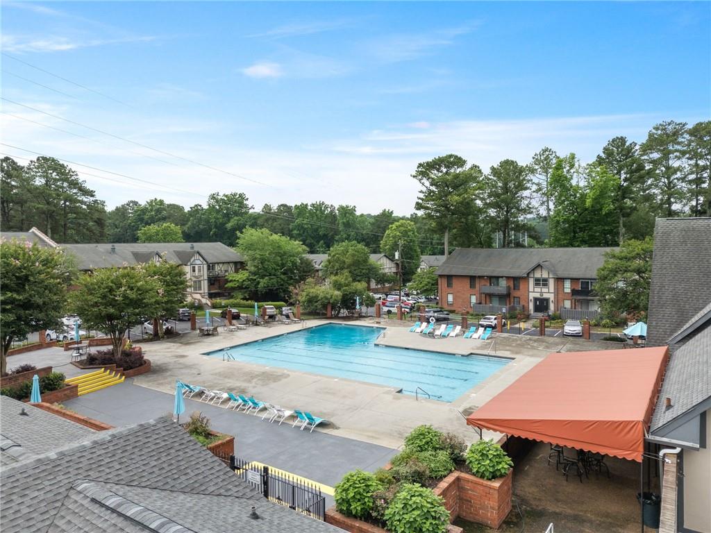 6851 Roswell Road, Unit H26 Atlanta, GA 30328 - Photo 45 of 49 an outdoor space with patio furniture