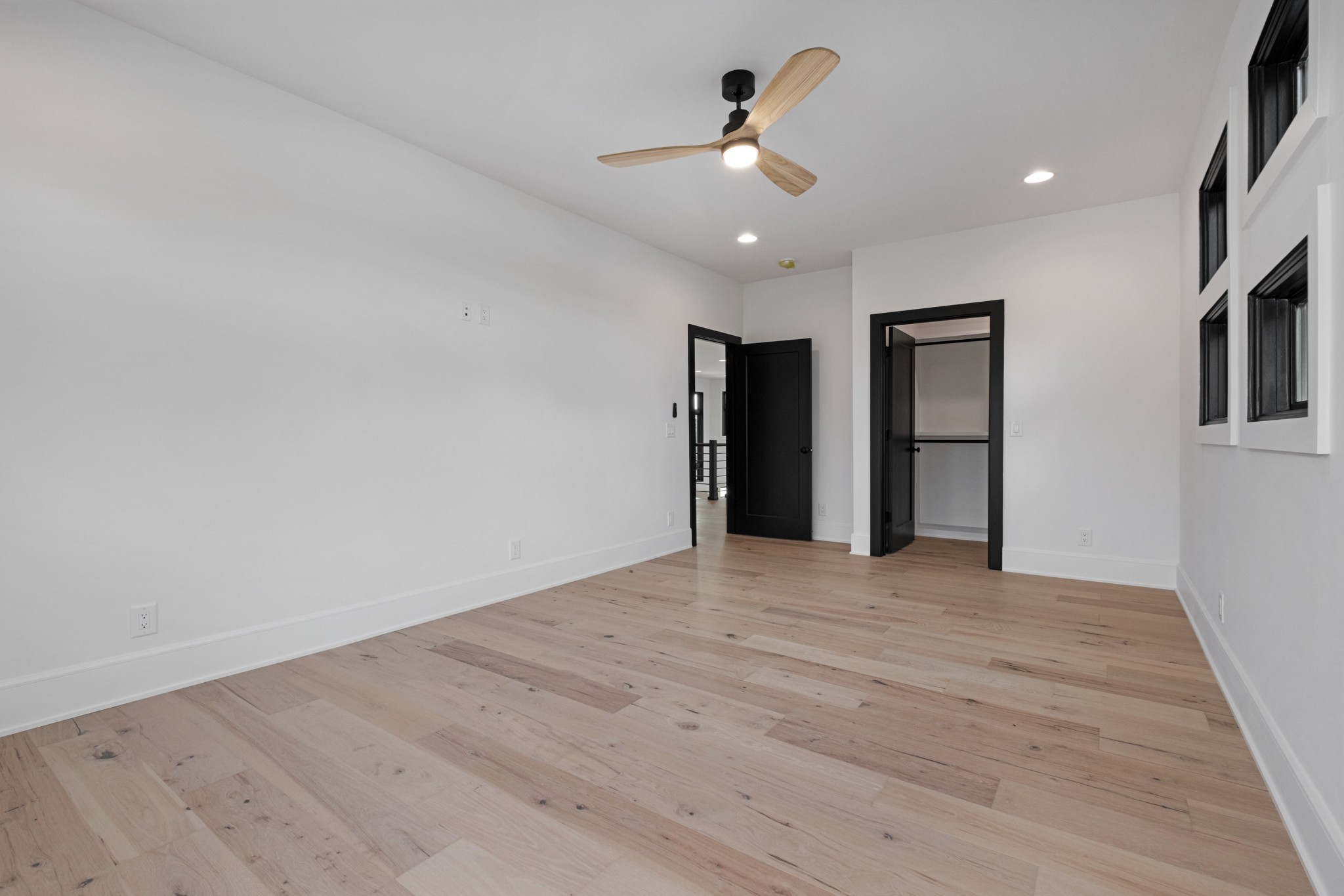 613 Waters Edge Drive Estill Springs, TN 37330 - Photo 30 of 36 a view of an empty room with a ceiling fan