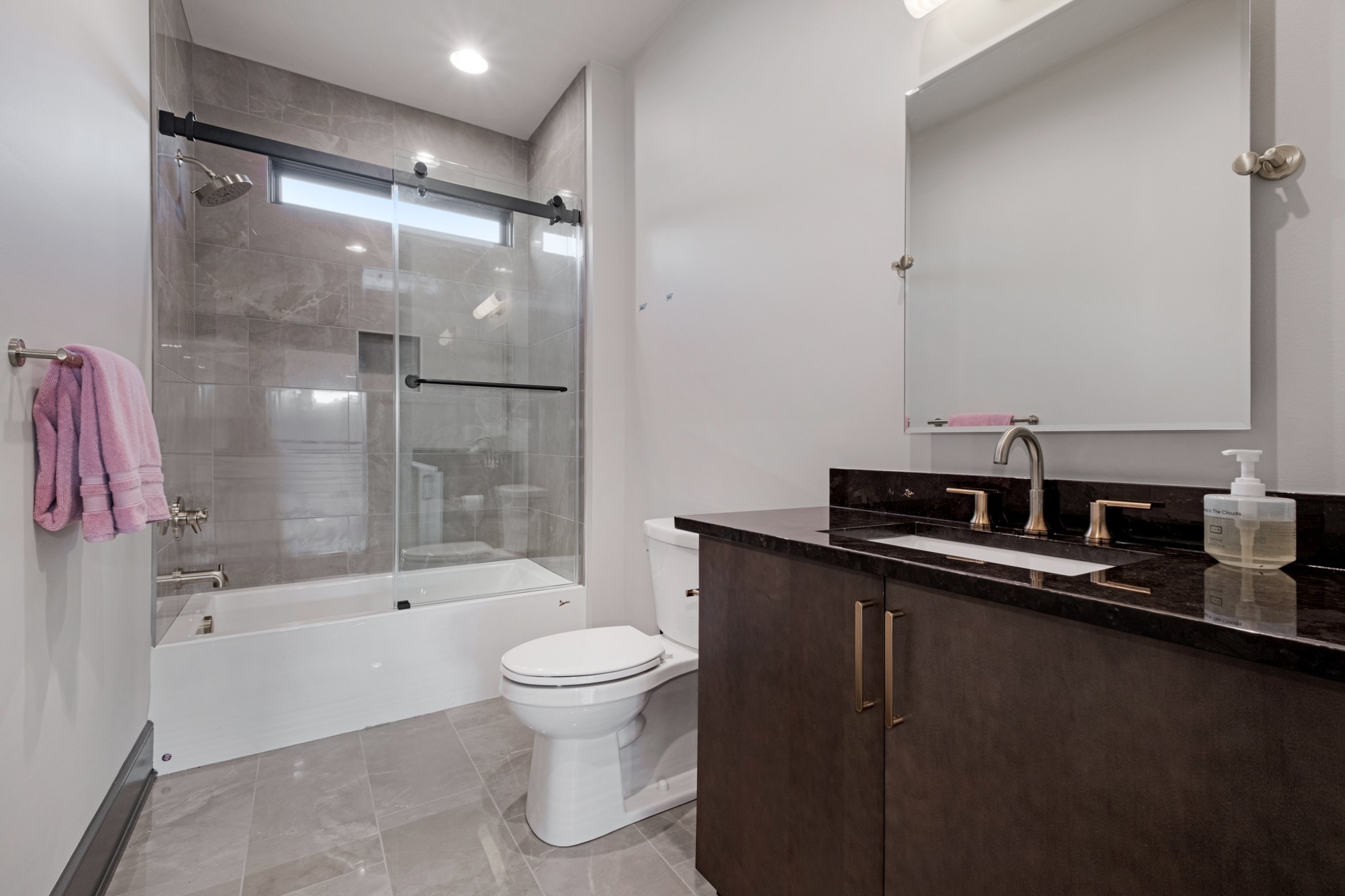 613 Waters Edge Drive Estill Springs, TN 37330 - Photo 31 of 36 a bathroom with a sink a toilet and shower