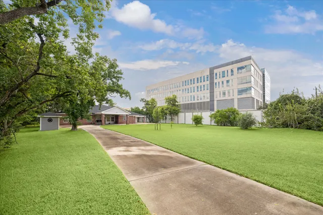a view of a house with a big yard