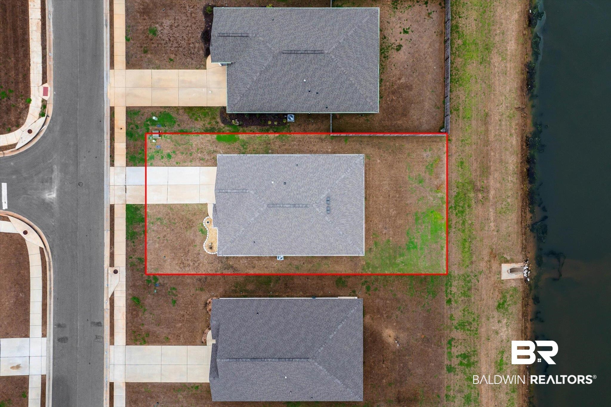 17041 Muse Street Loxley, AL 36551 - Photo 31 of 44 Aerial view of property and surrounding area featuring a nearby body of water and property boundaries highlighted