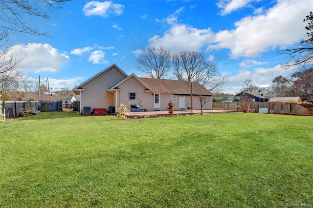a view of a house with a big yard