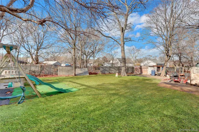 a view of a park with large trees