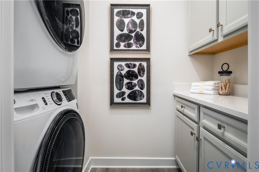 2806 Calgary Loop Chester, VA 23831 - Photo 16 of 20 a view of walk in closet with clothes and shoes