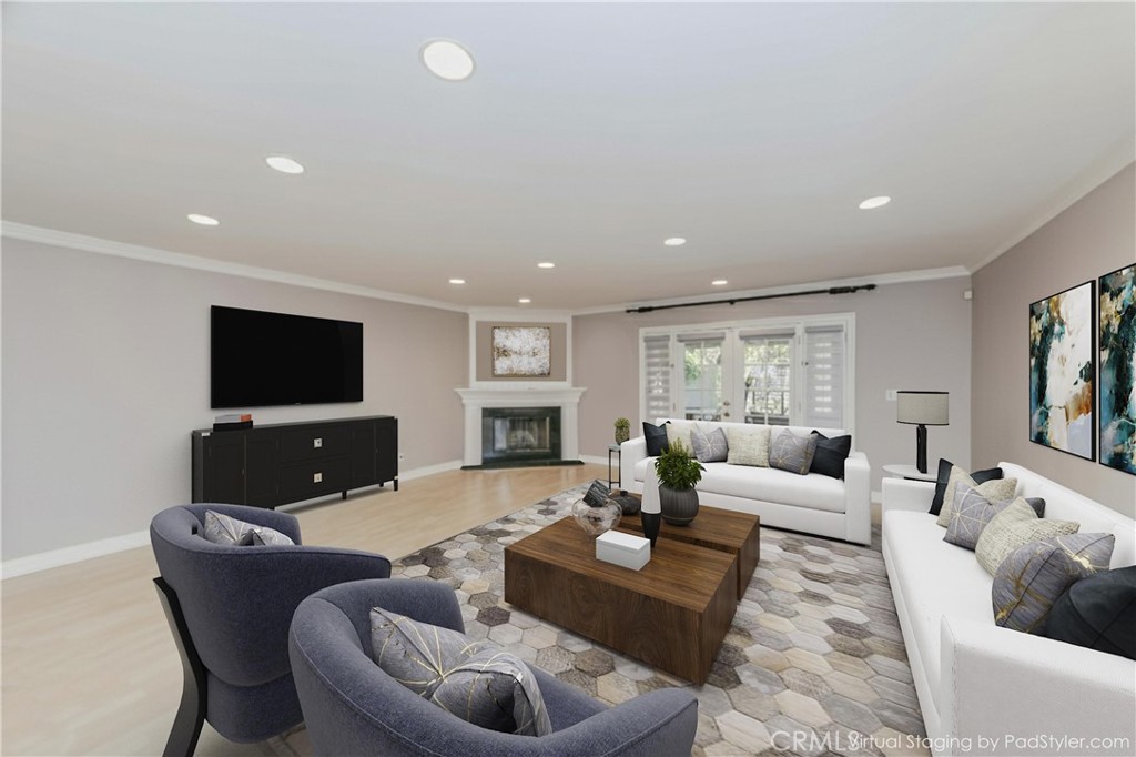 5431 Marion Avenue Cypress, CA 90630 - Photo 11 of 22 a living room with furniture and a flat screen tv