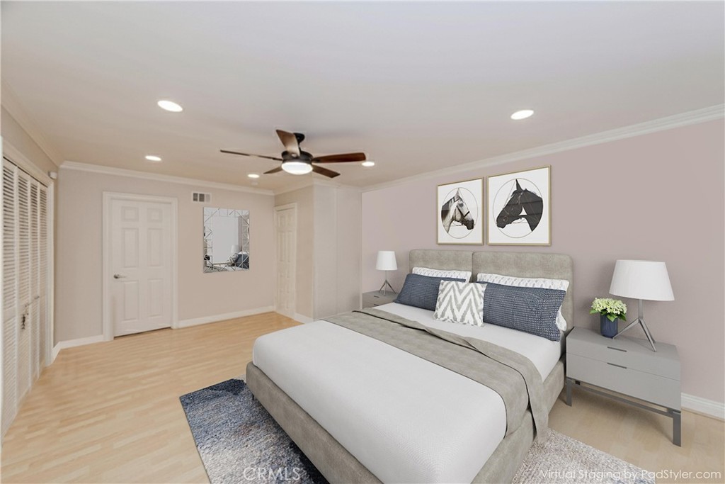 5431 Marion Avenue Cypress, CA 90630 - Photo 13 of 22 a bedroom with a bed and a painting on the wall