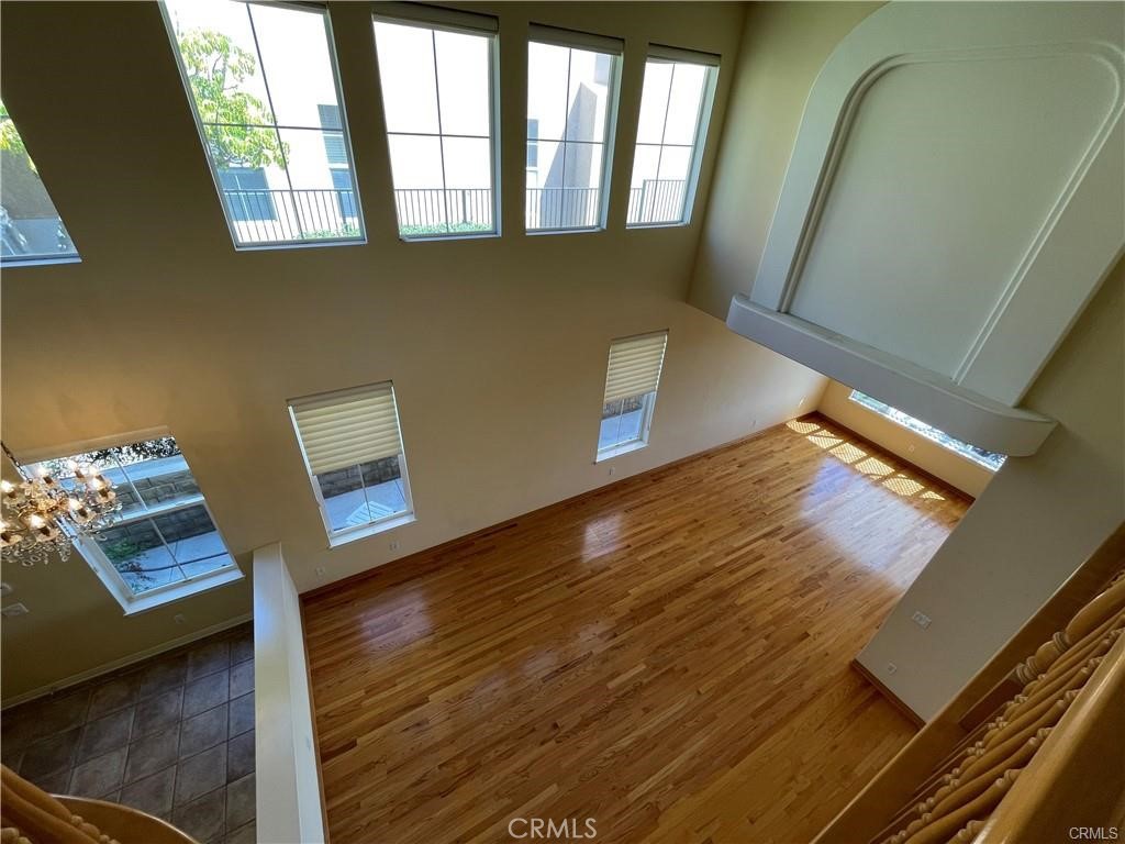 11736 Mariposa Bay Lane Porter Ranch, CA 91326 - Photo 3 of 22 Formal living room with vindows throughout